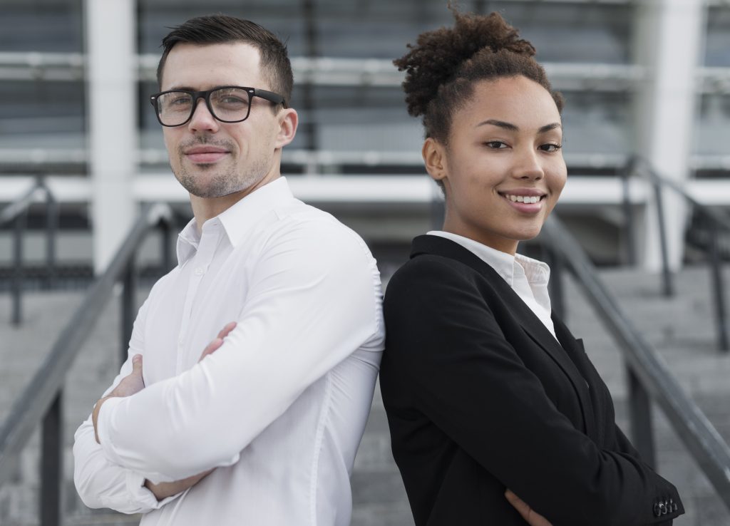 coworkers posing medium shot